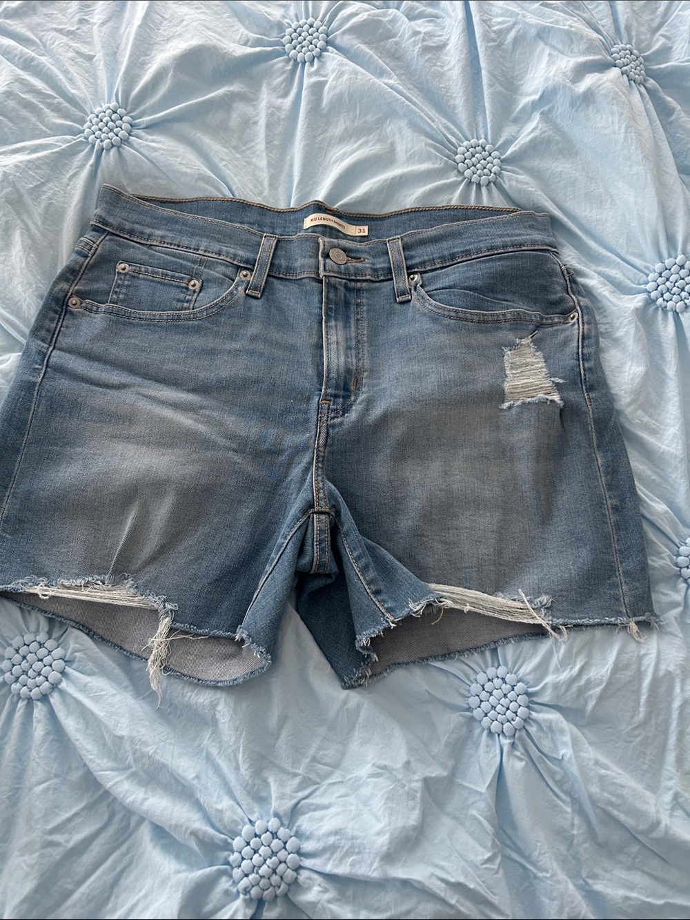 Levi's Light Blue Distressed Denim Cutoff Shorts